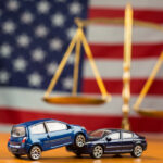 two cars on attorney's desk